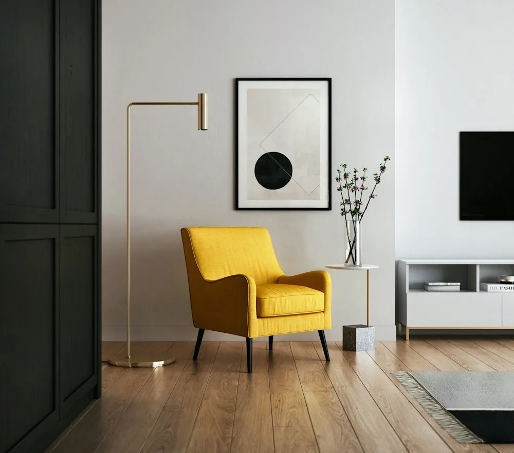 Mustard yellow armchair against a deep green door and pale wall, demonstrating paint undertones.